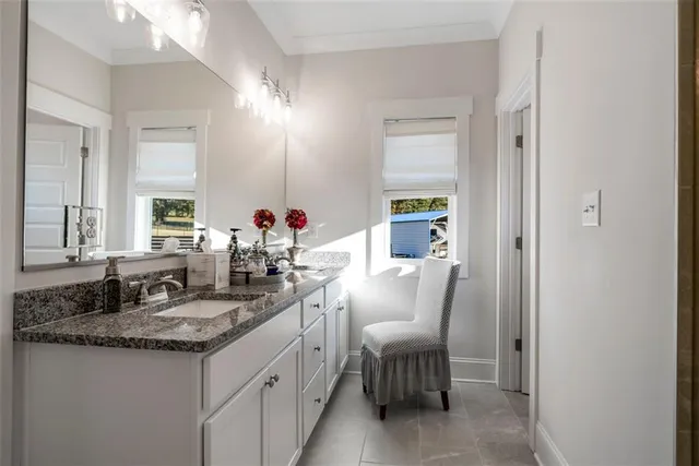 a bathroom with a glass shower door