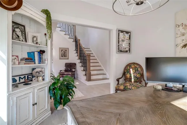 a bedroom with furniture and a lamp