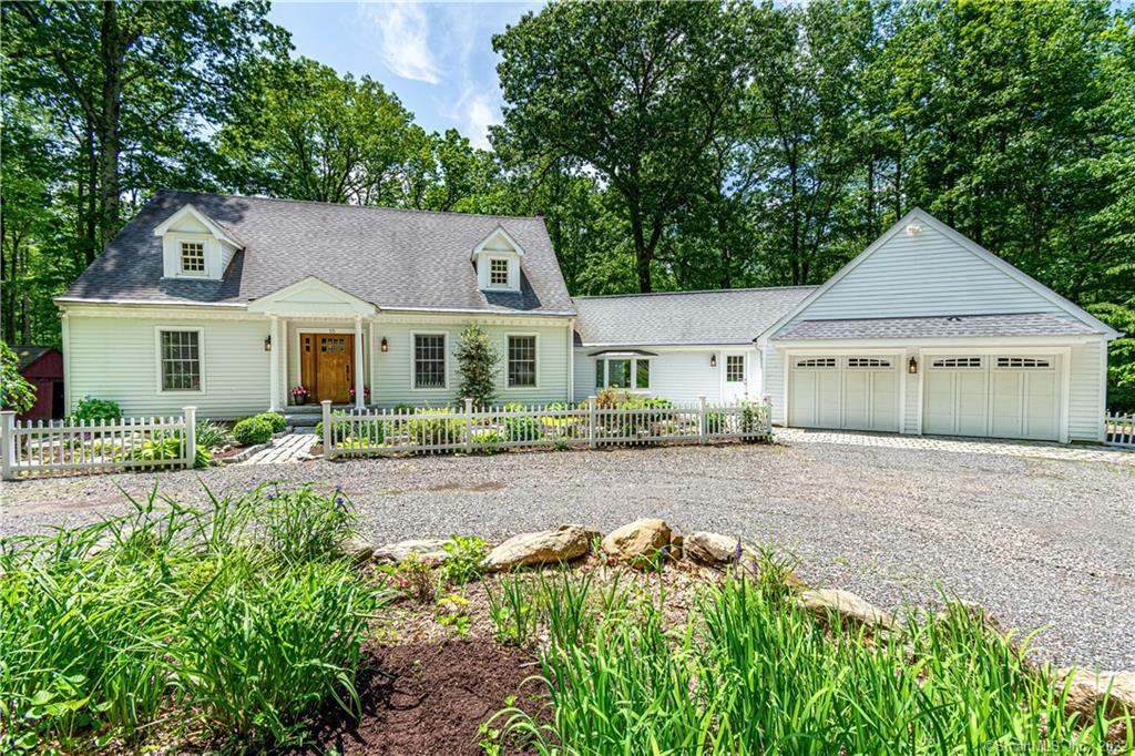 55 Mt Pleasant Road Newtown, CT 06470 - Photo 1 of 1 a view of a house with a yard and large tree