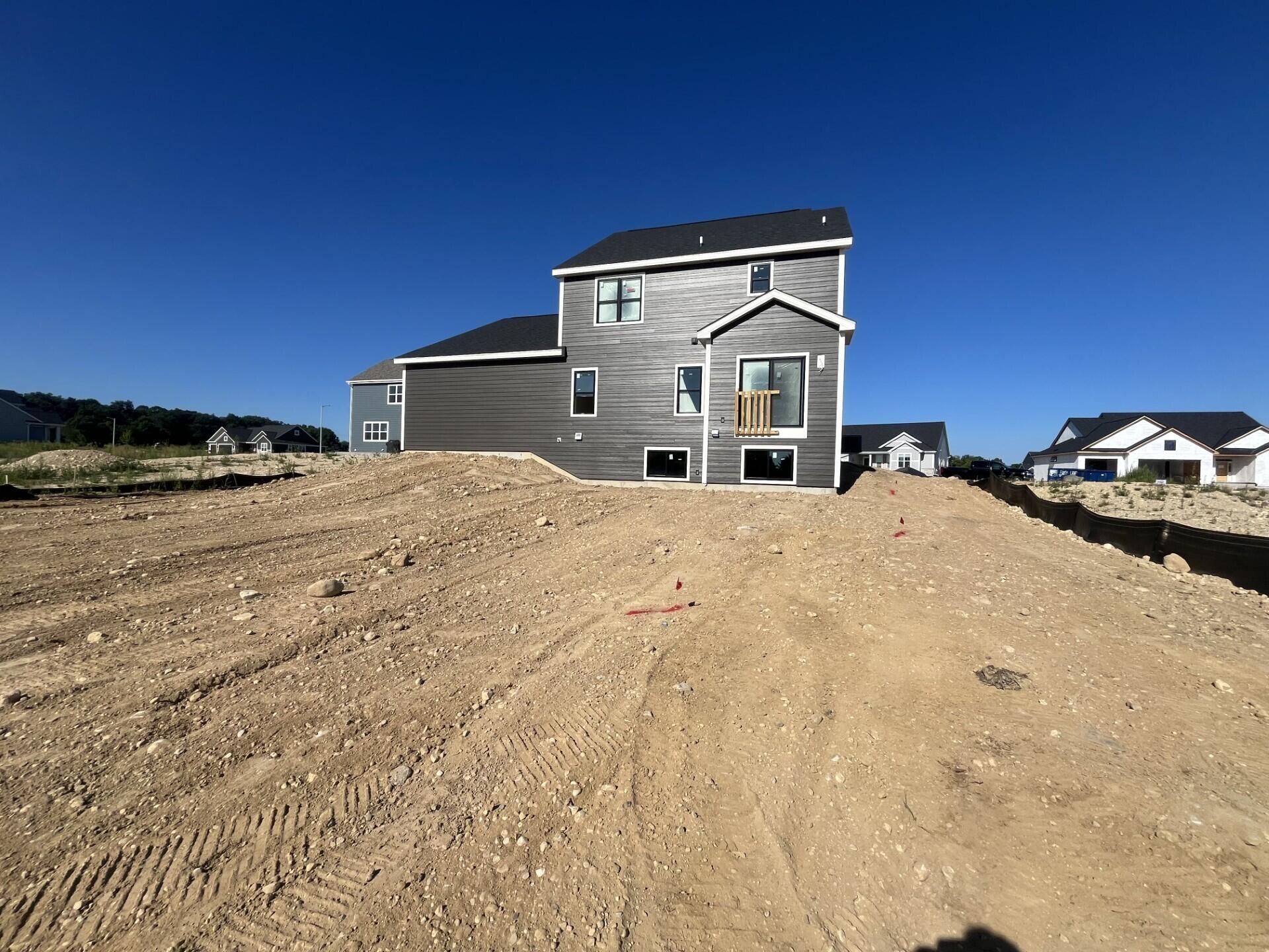 470 Limestone Lane Slinger, WI 53086 - Photo 11 of 13 Rear Elevation-Partial Exposure