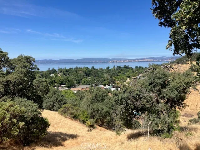 a view of a city and mountains in the background