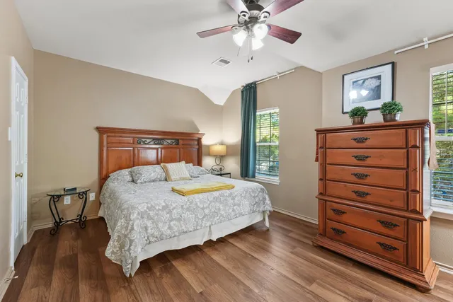 a picture of a bathroom with mirror