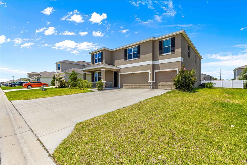 8142 Southwest 59th Avenue Ocala, FL 34476 - Photo 3 of 54 a front view of house with yard