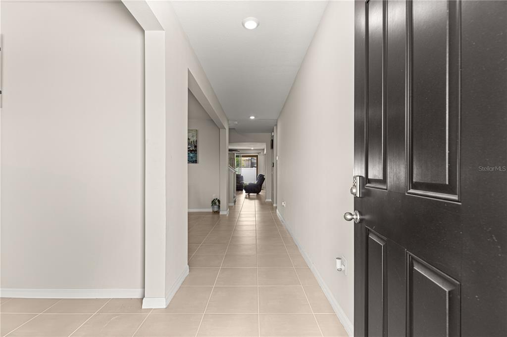 8142 Southwest 59th Avenue Ocala, FL 34476 - Photo 4 of 54 a view of hallway with livingroom