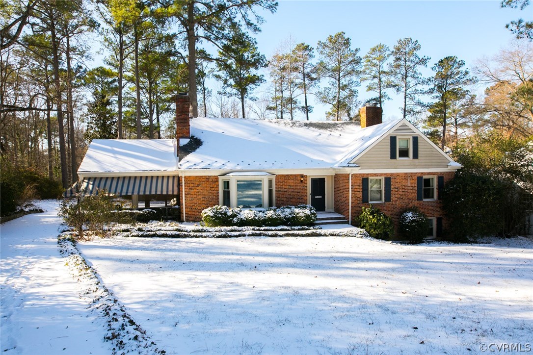 8013 Thom Road Henrico, VA 23229 - Photo 1 of 40 a front view of a house with a yard