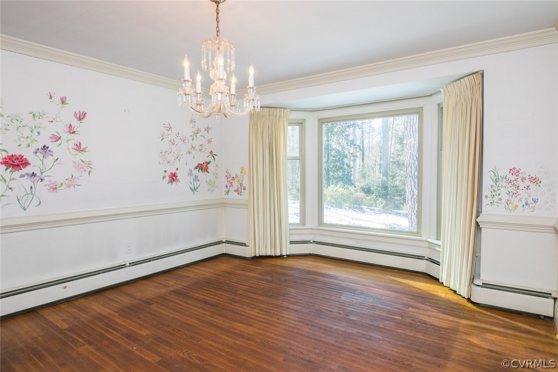 8013 Thom Road Henrico, VA 23229 - Photo 15 of 40 a view of an empty room with wooden floor and a window