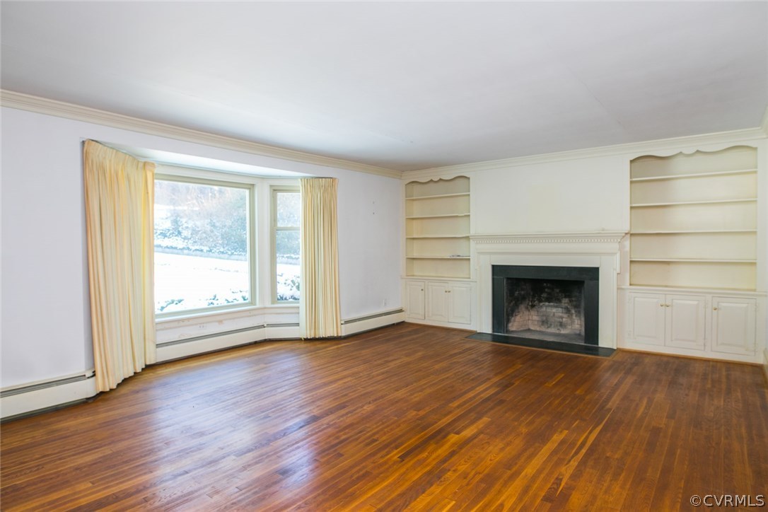 8013 Thom Road Henrico, VA 23229 - Photo 17 of 40 wooden floor fireplace and natural light in room