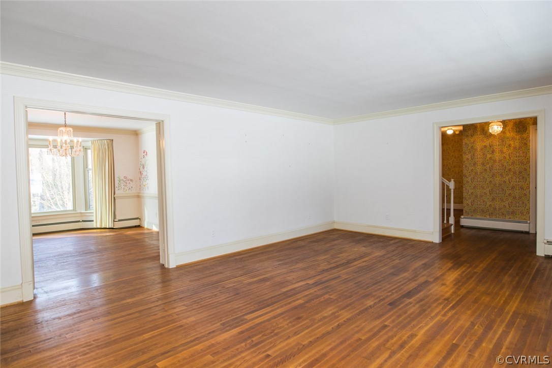 8013 Thom Road Henrico, VA 23229 - Photo 19 of 40 a view of an empty room with wooden floor and a window