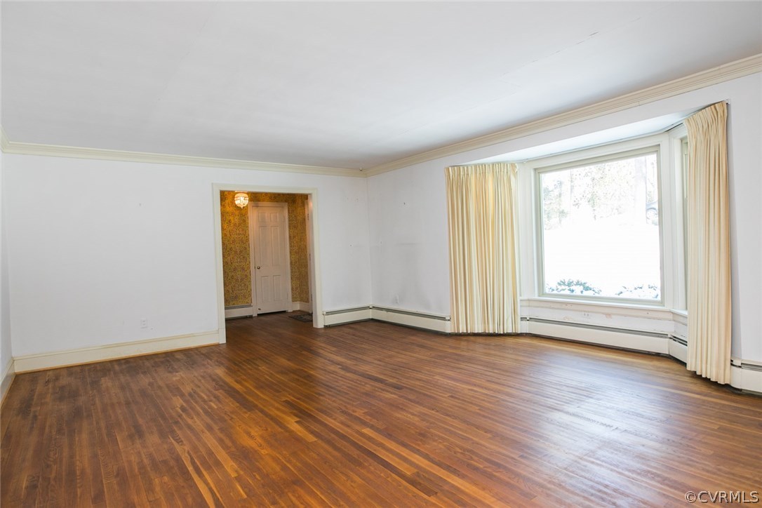 8013 Thom Road Henrico, VA 23229 - Photo 20 of 40 an empty room with wooden floor and windows