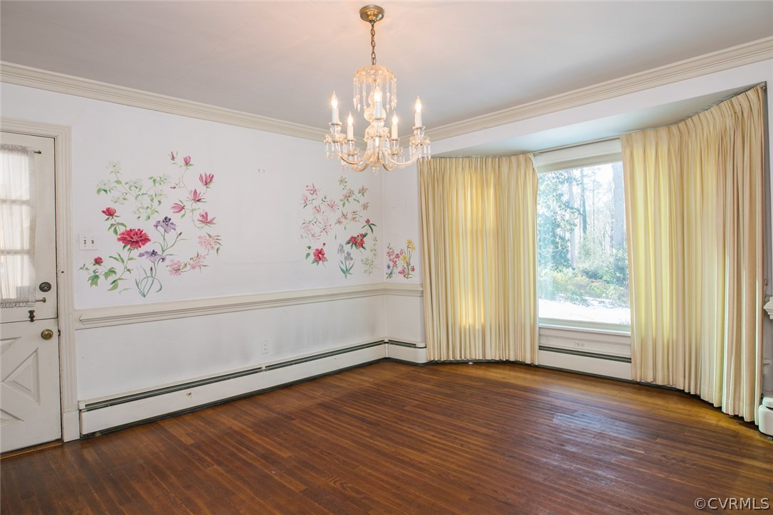 8013 Thom Road Henrico, VA 23229 - Photo 3 of 40 a view of a hallway with wooden floor and windows