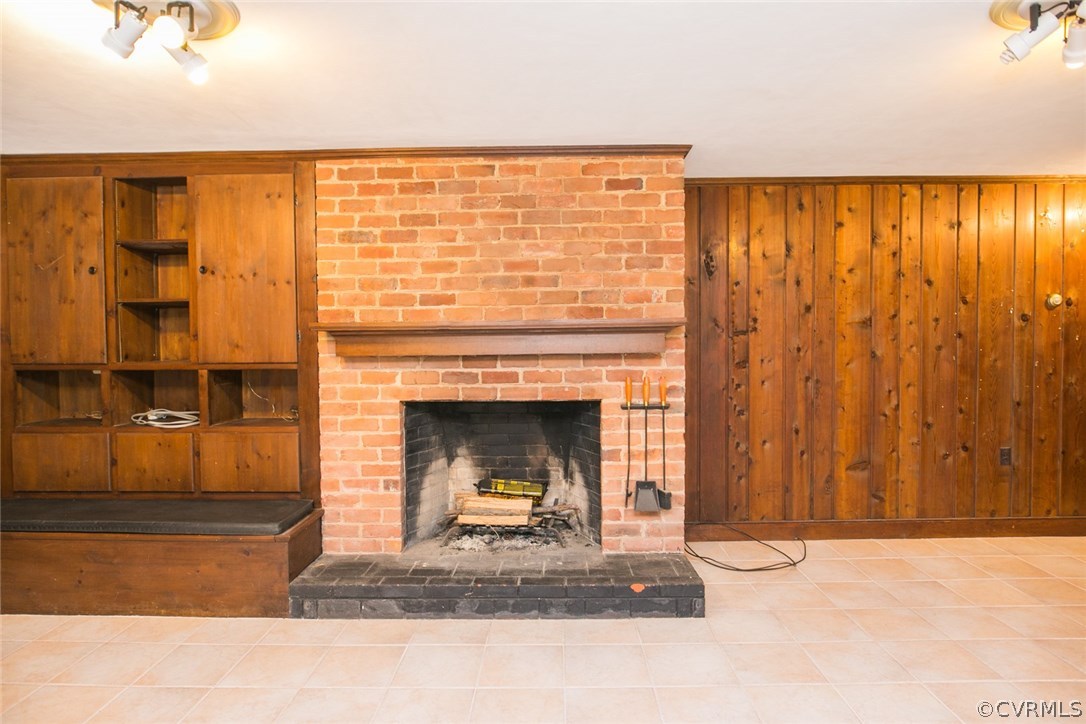 8013 Thom Road Henrico, VA 23229 - Photo 32 of 40 a living room with a fireplace furniture and a window