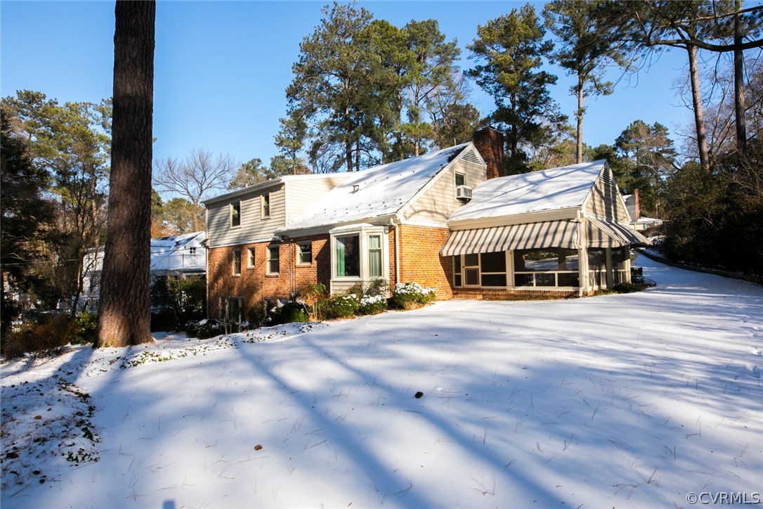 8013 Thom Road Henrico, VA 23229 - Photo 39 of 40 a front view of a house with a garden