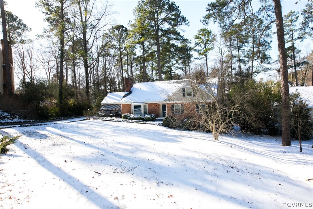 8013 Thom Road Henrico, VA 23229 - Photo 40 of 40 a backyard of a house with trees and barbeque oven