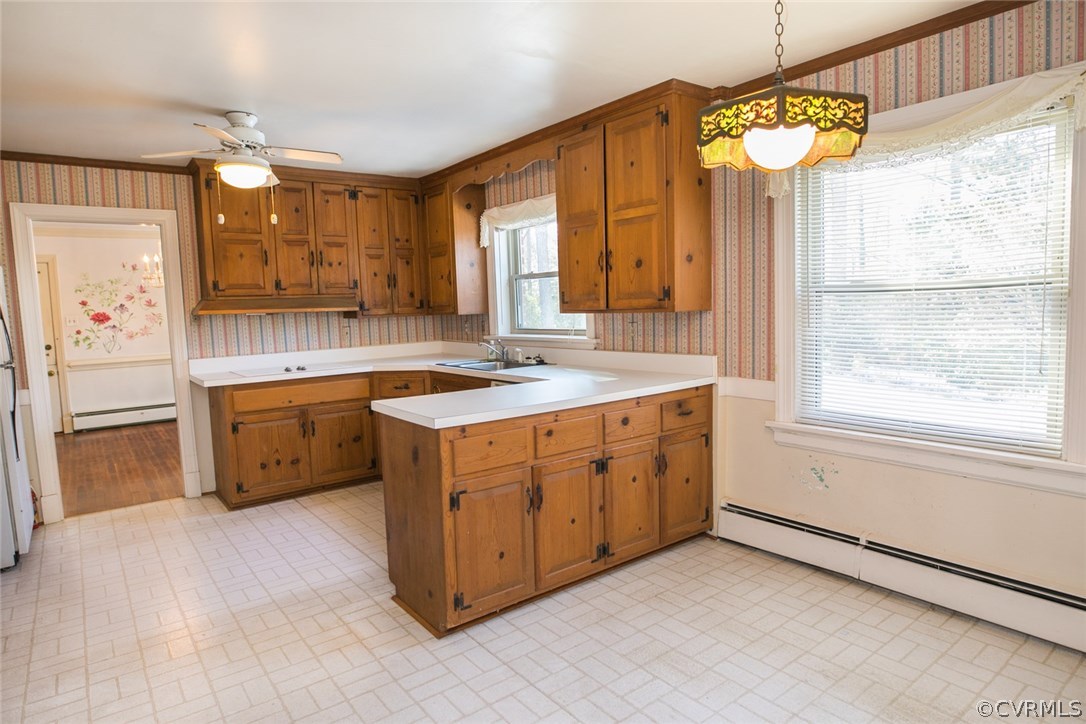 8013 Thom Road Henrico, VA 23229 - Photo 8 of 40 a kitchen with a sink stove and refrigerator