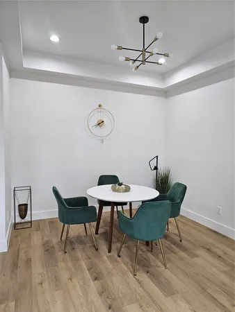 a view of a table and chairs in a room