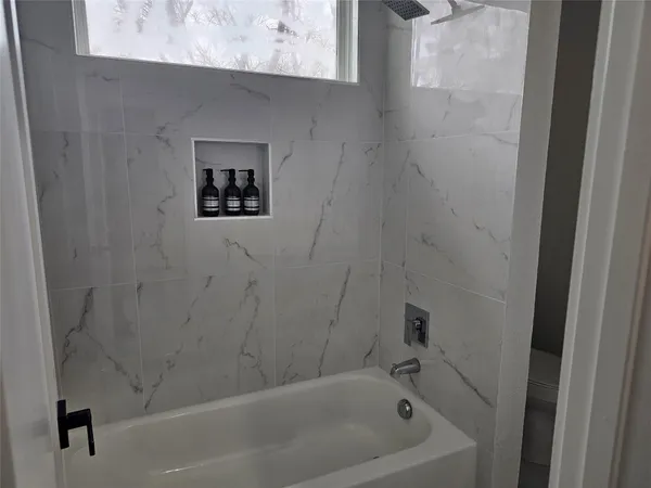 a bathroom with a bathtub