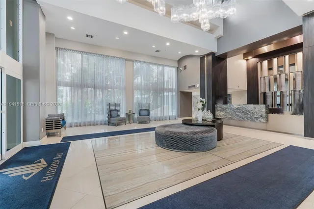 a large living room with a large window