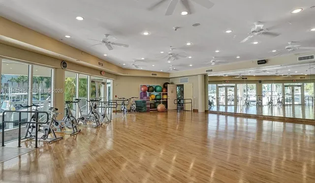 a lobby with furniture and floor to ceiling window