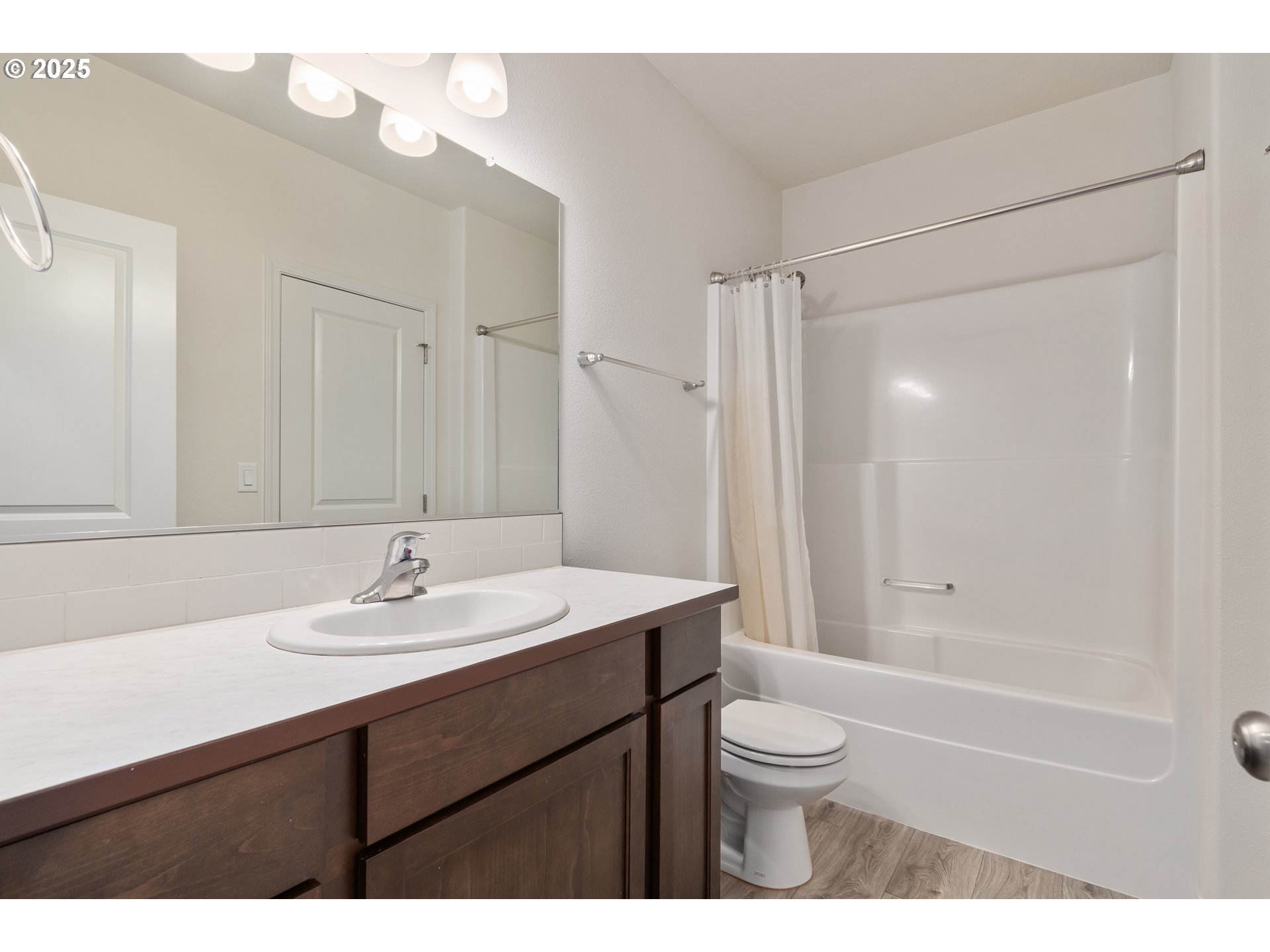 5292 Squirrel Street Springfield, OR 97478 - Photo 17 of 34 a bathroom with a sink a toilet and shower