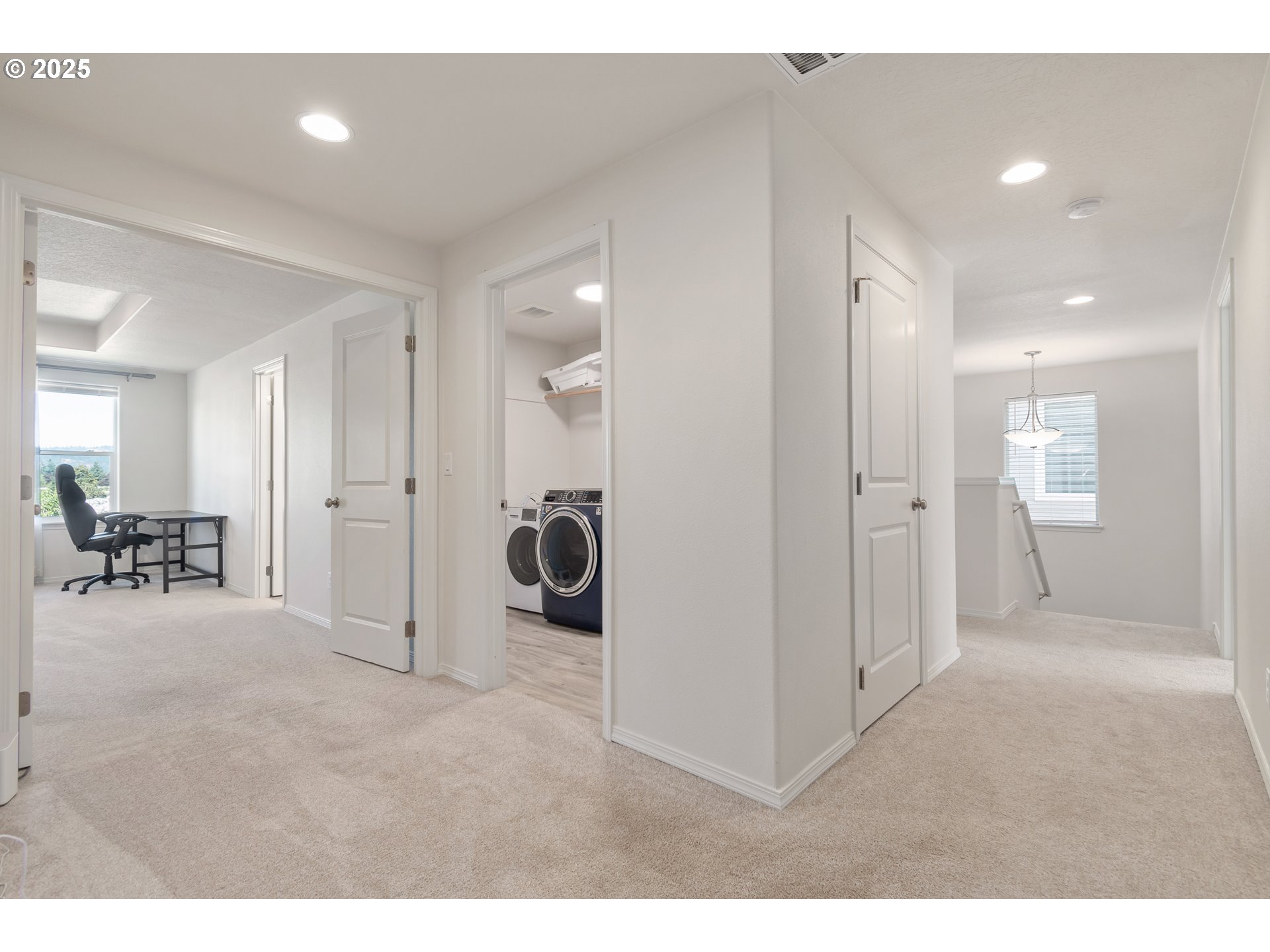 5292 Squirrel Street Springfield, OR 97478 - Photo 18 of 34 a view of a livingroom with a hall and dining room