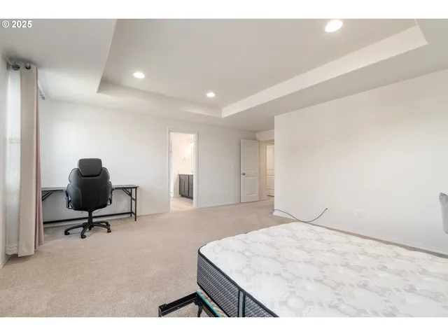 a bathroom with a double vanity sink a mirror and a shower