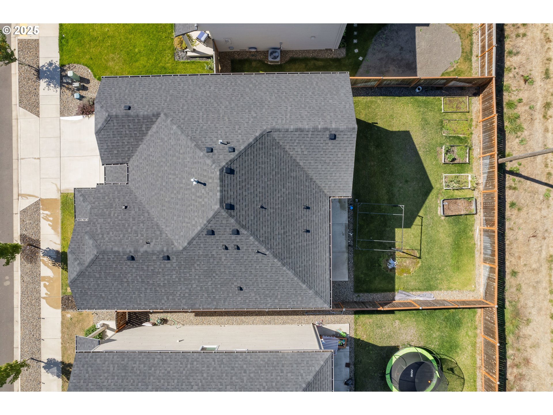 5292 Squirrel Street Springfield, OR 97478 - Photo 33 of 34 an aerial view of a house with a garden