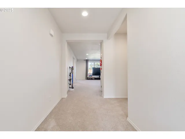 close view of an empty room with wooden floor