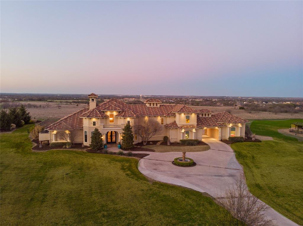 216 Nueces Trail Aledo, TX 76008 - Photo 1 of 1 an aerial view of a house with a garden and lake view