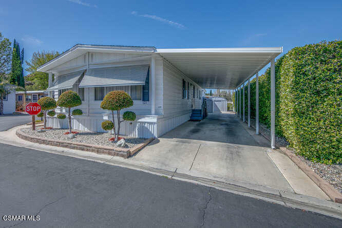 6480 Katherine Road, Unit 121 Simi Valley, CA 93063 - Photo 2 of 34 a view of a house with entertaining space