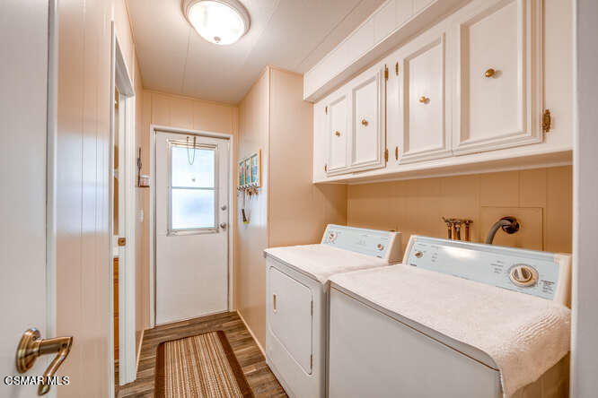 6480 Katherine Road, Unit 121 Simi Valley, CA 93063 - Photo 16 of 34 a utility room with dryer and washer
