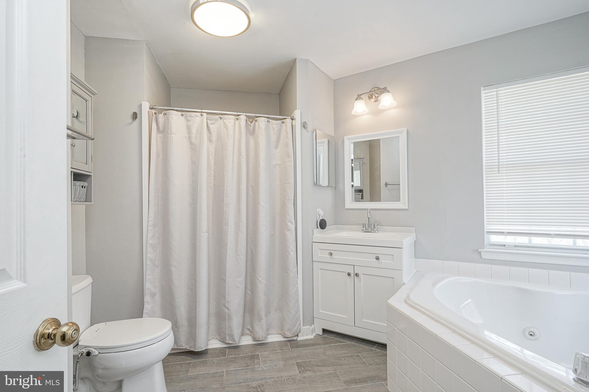 7 Middleton Drive Lumberton, NJ 08048 - Photo 16 of 42 a bathroom with a sink a toilet and a bathtub