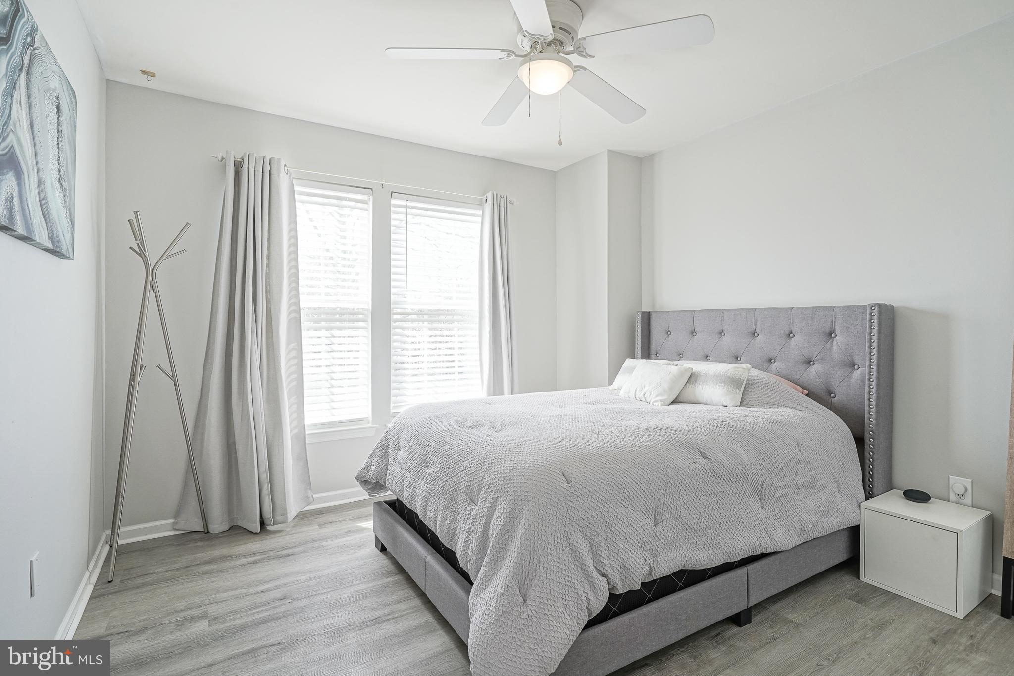 7 Middleton Drive Lumberton, NJ 08048 - Photo 19 of 42 a bedroom with a bed and a chandelier