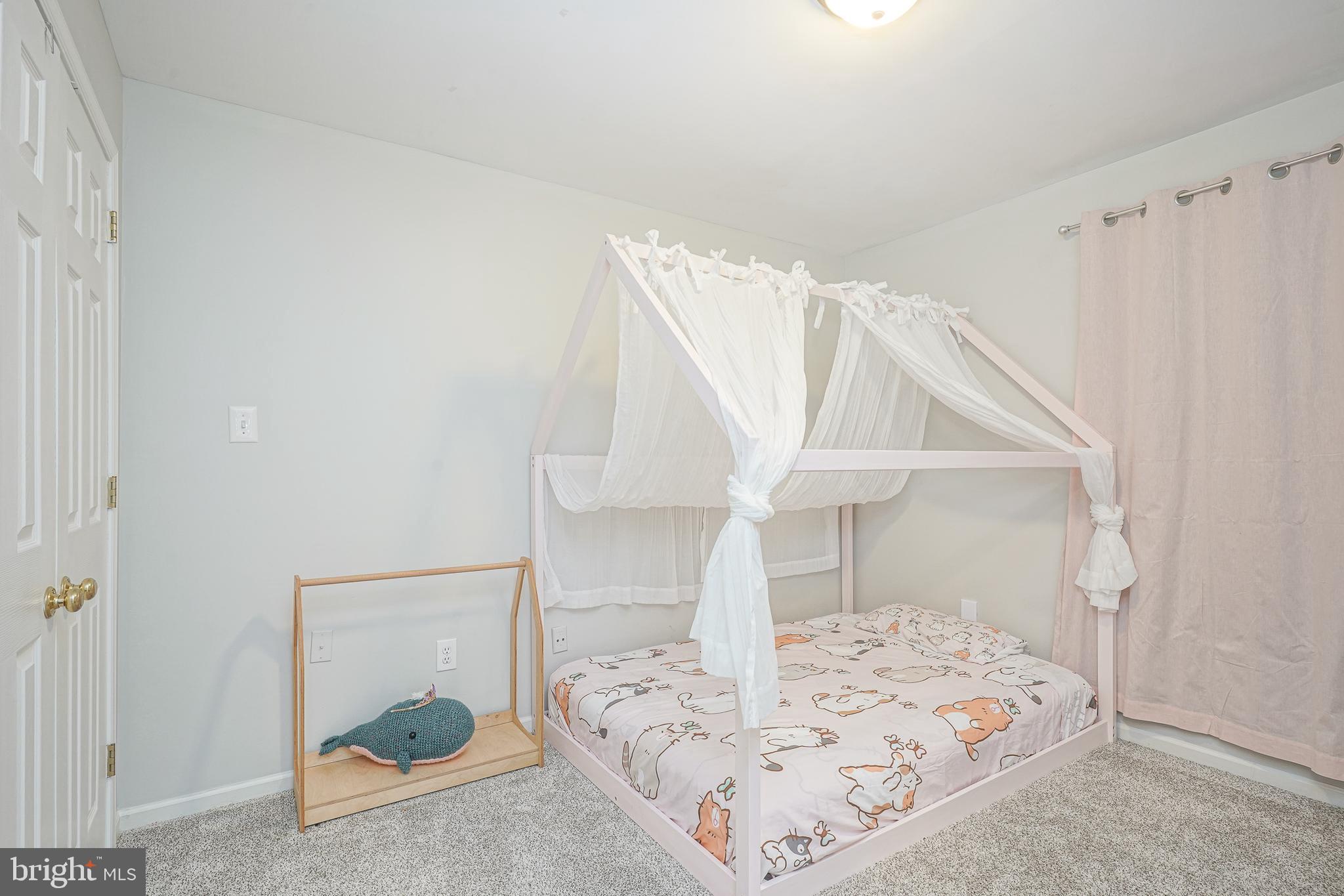7 Middleton Drive Lumberton, NJ 08048 - Photo 20 of 42 a view of a bedroom with a bed and wooden floor