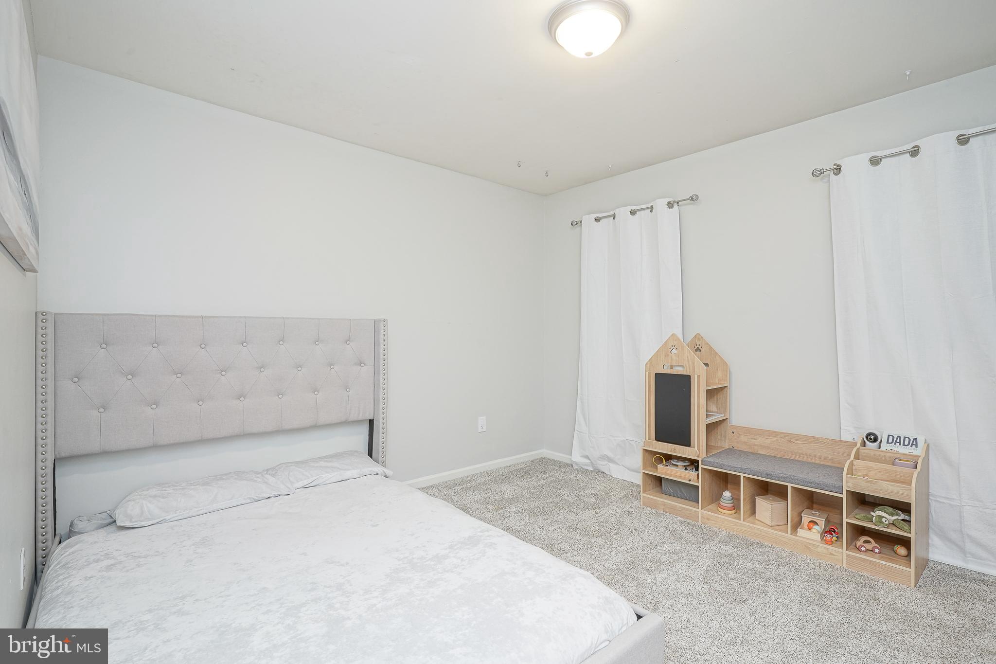 7 Middleton Drive Lumberton, NJ 08048 - Photo 25 of 42 a bedroom with a bed and a table in it