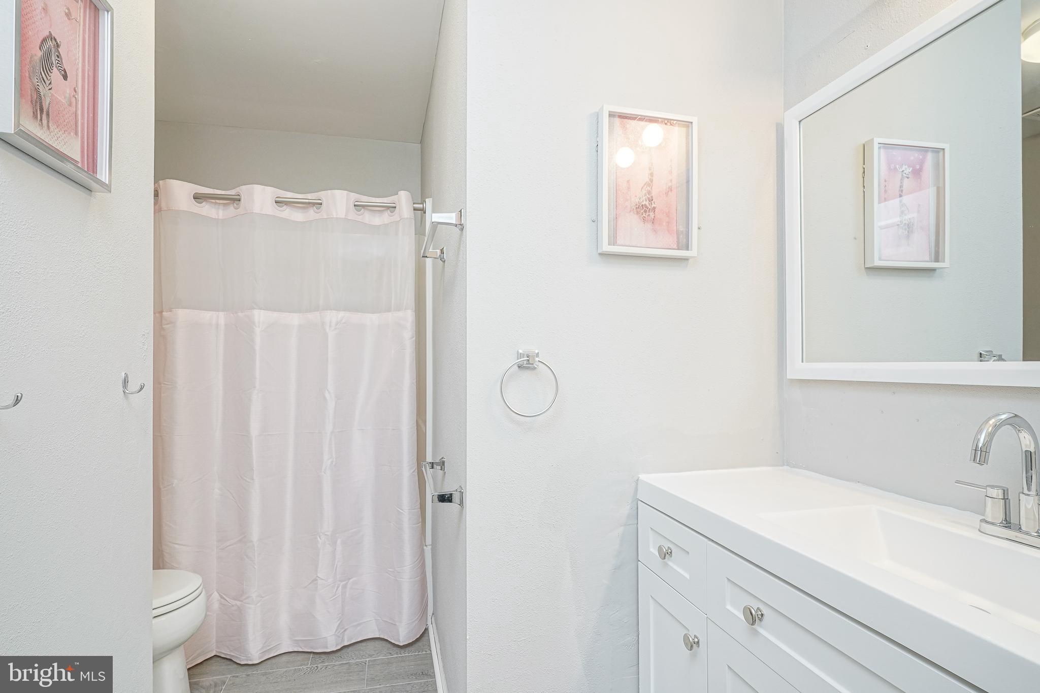 7 Middleton Drive Lumberton, NJ 08048 - Photo 26 of 42 a bathroom with a sink and a mirror