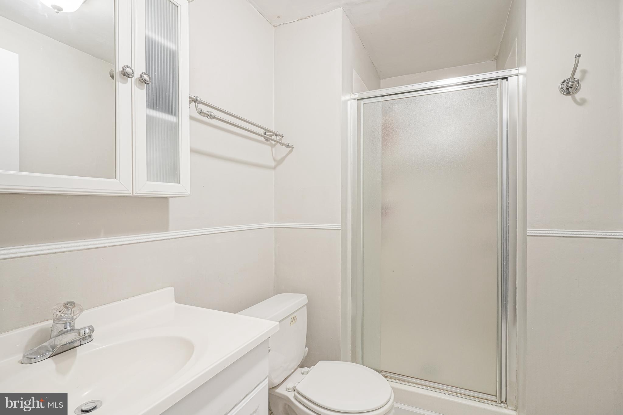 7 Middleton Drive Lumberton, NJ 08048 - Photo 29 of 42 a white toilet sitting next to a bathroom sink
