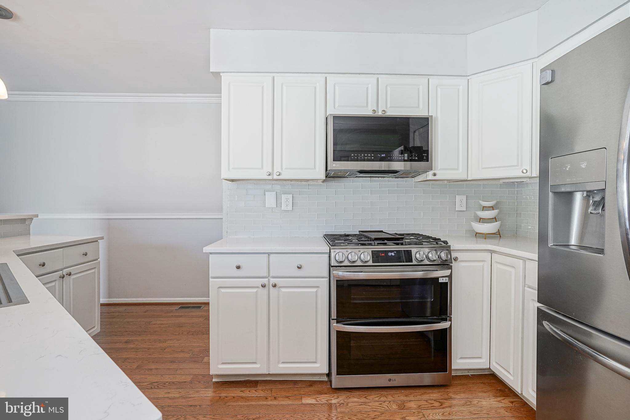7 Middleton Drive Lumberton, NJ 08048 - Photo 6 of 42 a kitchen with a stove and a microwave