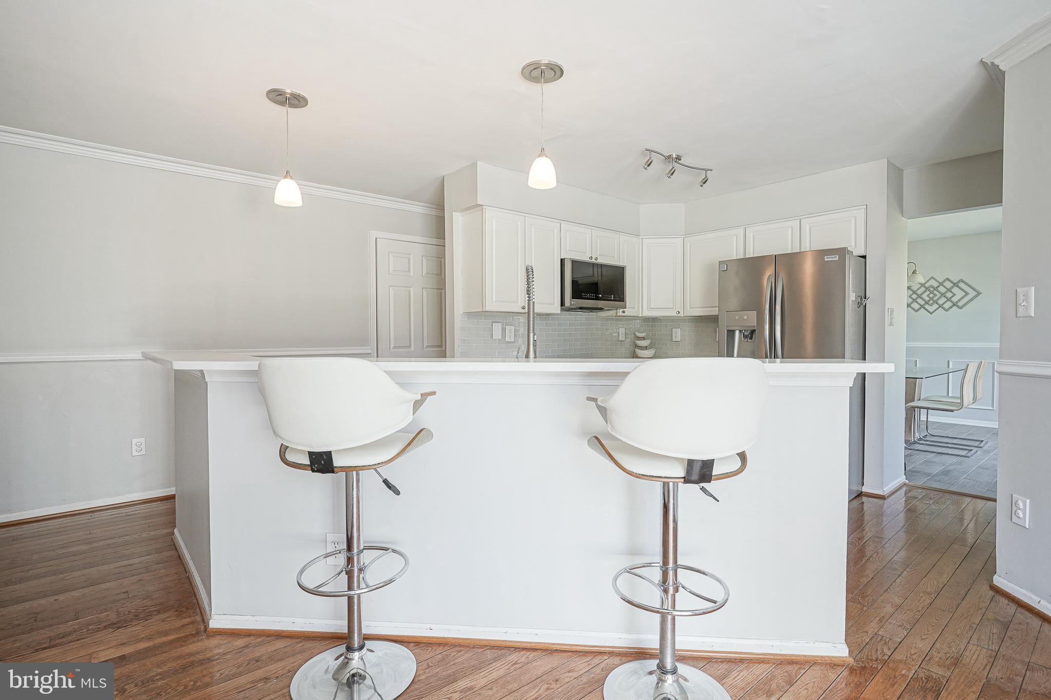 7 Middleton Drive Lumberton, NJ 08048 - Photo 7 of 42 a kitchen with stainless steel appliances kitchen island a refrigerator and a dining table