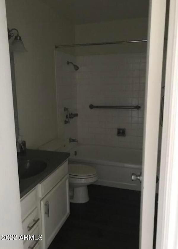 2021 West Hayward Avenue, Unit 5 Phoenix, AZ 85021 - Photo 12 of 15 a bathroom with a sink a toilet and shower