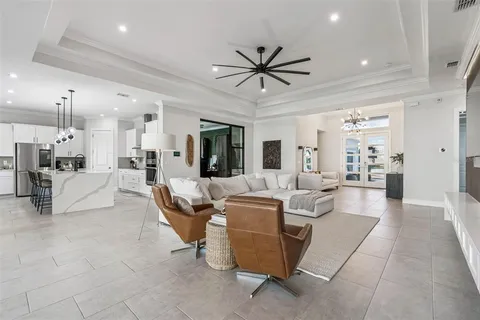 a kitchen with refrigerator a stove a sink and a oven