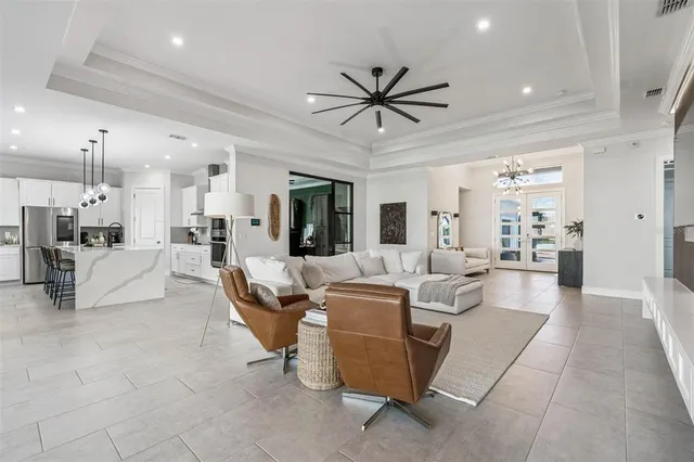 a kitchen with refrigerator a stove a sink and a oven