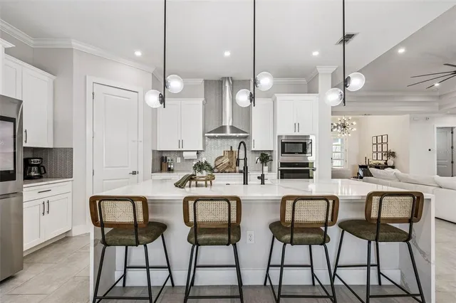 a view of a living room and a balcony
