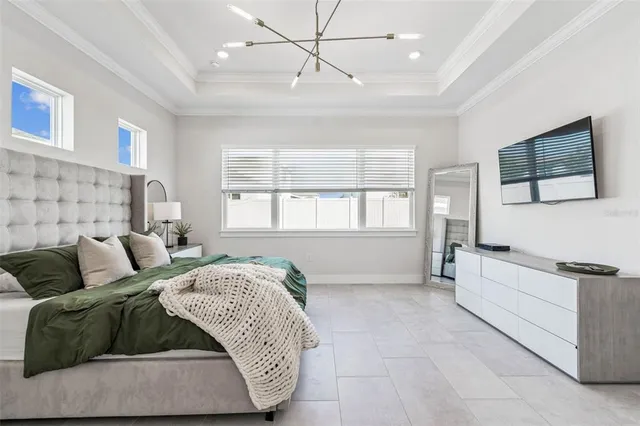 a bathroom with a double vanity sink a mirror and a bathtub