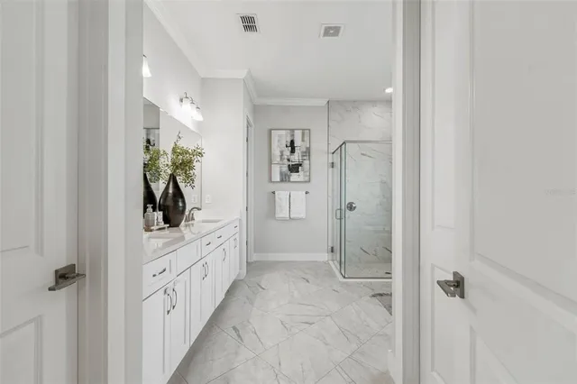 a bathroom with a bathtub and shower