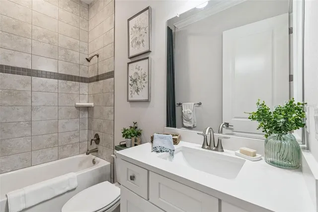 a view of a livingroom with a kitchen