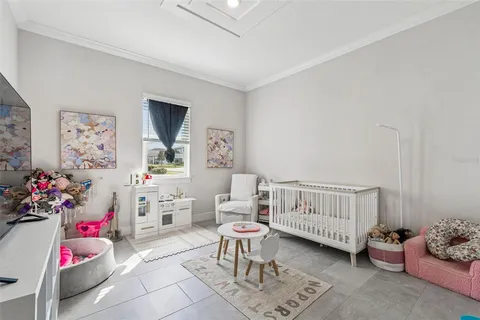 a view of a house with backyard and porch