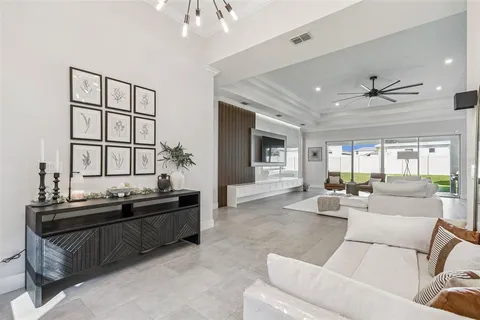 a living room with a couch and a rug