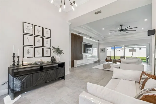 a living room with a couch and a rug