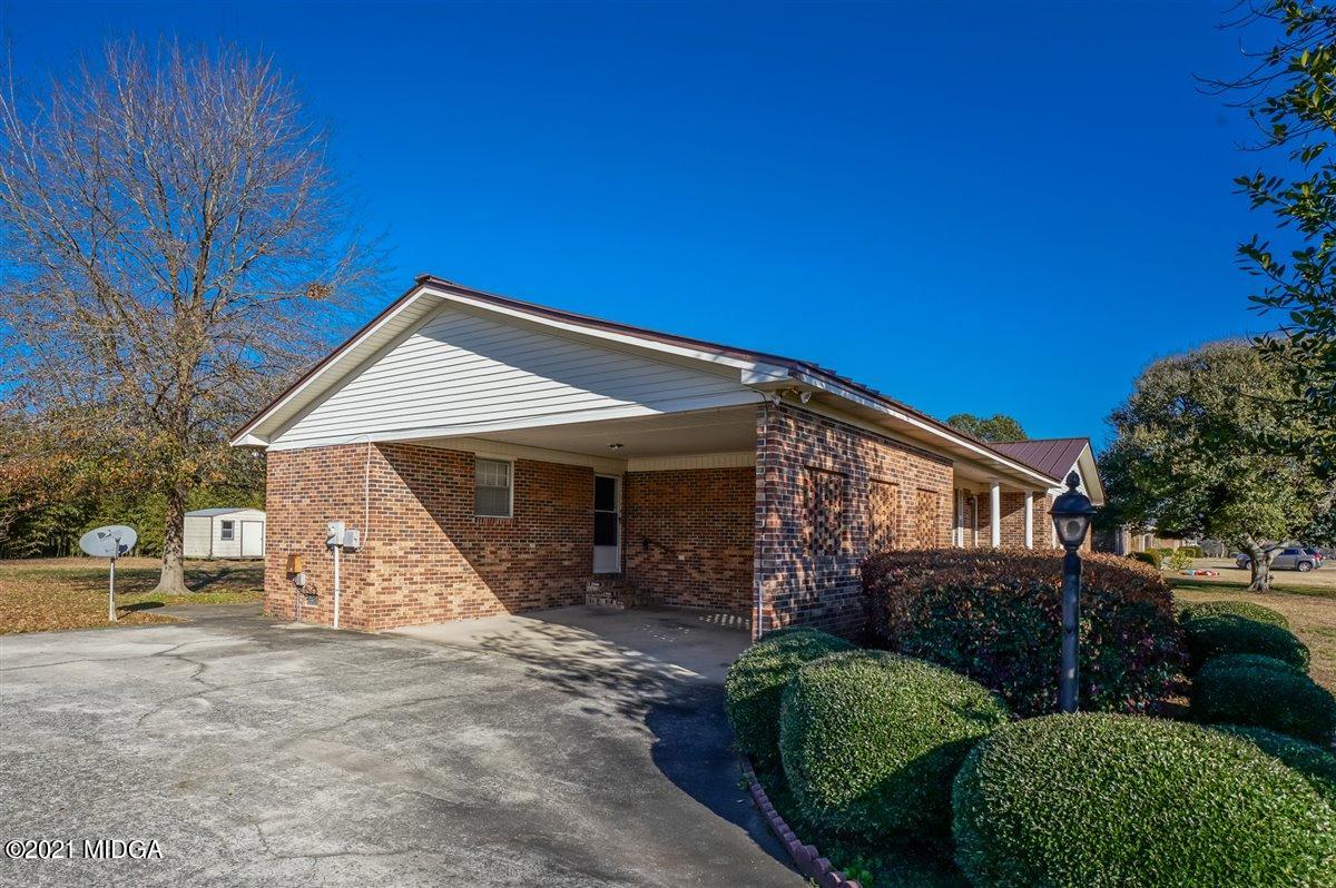 3309 Sandy Circle Macon, GA 31216 - Photo 2 of 35 a view of a house with a yard