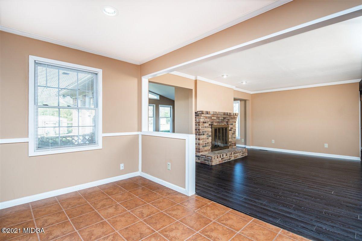 3309 Sandy Circle Macon, GA 31216 - Photo 16 of 35 an empty room with wooden floor and windows